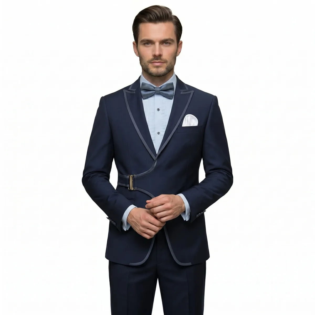 Men’s black tuxedo with satin piping, buckle detail, matching trousers, dress shirt, bow tie, and pocket square by Andre Emilio